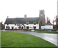 View from the green towards The Crown and St Mary Magdalene