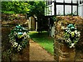 Gateway in to the garden of the Ockenden Manor Hotel