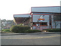 Looking from Royal Mail in Woolsack Way towards Catteshall Lane