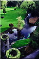 W6075 : Blarney Castle Grounds - Adjacent towers & stream by Joseph Mischyshyn