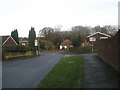 Looking along Bulls Copse Lane towards Westbrooke Close