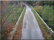 NU2517 : Bridge over road near Howick Hall by Les Hull