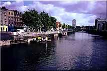 O1534 : Dublin - River Liffey east of The Millennium Bridge 1990 by Joseph Mischyshyn