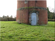 TQ3434 : Vandal proof door at base of water tower by Dave Spicer