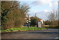 A crowded signpost near the Grove Ferry Inn