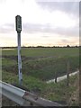 Public footpath sign at Roe Lane Bridge