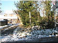 Road and footpath junction in Rake Lane