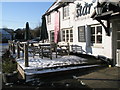 Snow covered tables outside The Star