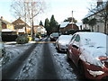 Snow on the cars in Roke Lane