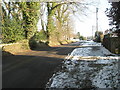 Distant white van in Oxted Green