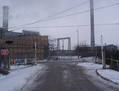 TQ8674 : Railway crossing near Medway Power Station by David Anstiss