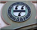 Black Pear shield on Foregate railway bridge