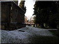 Lingering snow in the churchyard at St Mary, Shalford (2)