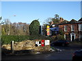 Postbox at the junction of Church Close and the A281