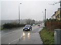 Ambulance heading south-east in The Causeway