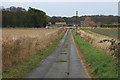 TG4819 : Farm road, East Somerton by Paul E Smith