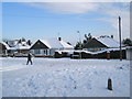 Looking from Littlepark Shops towards the postbox