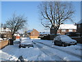 Approaching the junction of  a snowy Grateley Crescent and Linkenholt Way