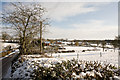 Houses and fields at Fritham in snow