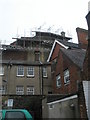 Looking from Tarrant Street towards scaffolding on a building in Maltravers Street