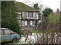 Timber framed house under repair, Marshborough