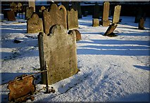 J4669 : Gravestones, St Mary's Church of Ireland by Rossographer