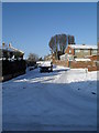 Looking down a snowy Kimbridge Crescent