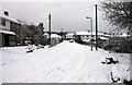 Looking up snow covered Rowles Close