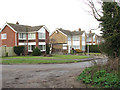 Houses on sharp bend in Church Lane