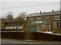 A rapid thaw creates a waterfall onto Hebden Road, Harworth