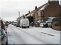 Mid section of a snowy Mansvid Avenue