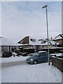 Lamppost in a snowy Court Lane