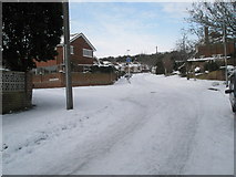 SU6605 : Approaching the junction of a snowy East Cosham Road and Courtmount Grove by Basher Eyre