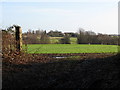 View over the River Stor valley to farms on Hurston Lane