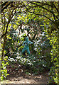 Statue of Pan in Coton Manor Gardens