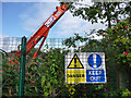 Warning notices alongside Metrolink worksite