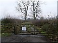 Warning on fence in the countryside near Kittochside