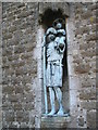 Statue by the main door at St Christopher, Weyhill