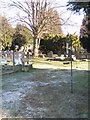 Seat in a frosty churchyard at St Stephen