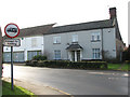 Cottages by the junction of Burnthouse Lane and School Road