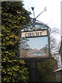 "Welcome to Churt" sign in the village centre