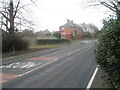 Looking along Main Road towards Woodfield