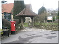 Postbox at the lych gate at Headley