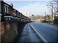 Terraced houses drop down Romsey Road towards the A35.