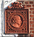 Commemorative plaque on cottage front