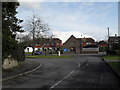 Approaching the junction of Church Lane and Tangmere Road