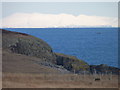 Cliffs at Foitealar with mountains on the mainland in the background