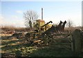 Old farm machinery in the corner