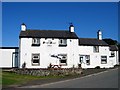 NY4762 : The Sportsman Inn, Laversdale by Andrew Curtis