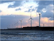 NZ3281 : Wind turbines on Blyth East Pier by Andrew Curtis